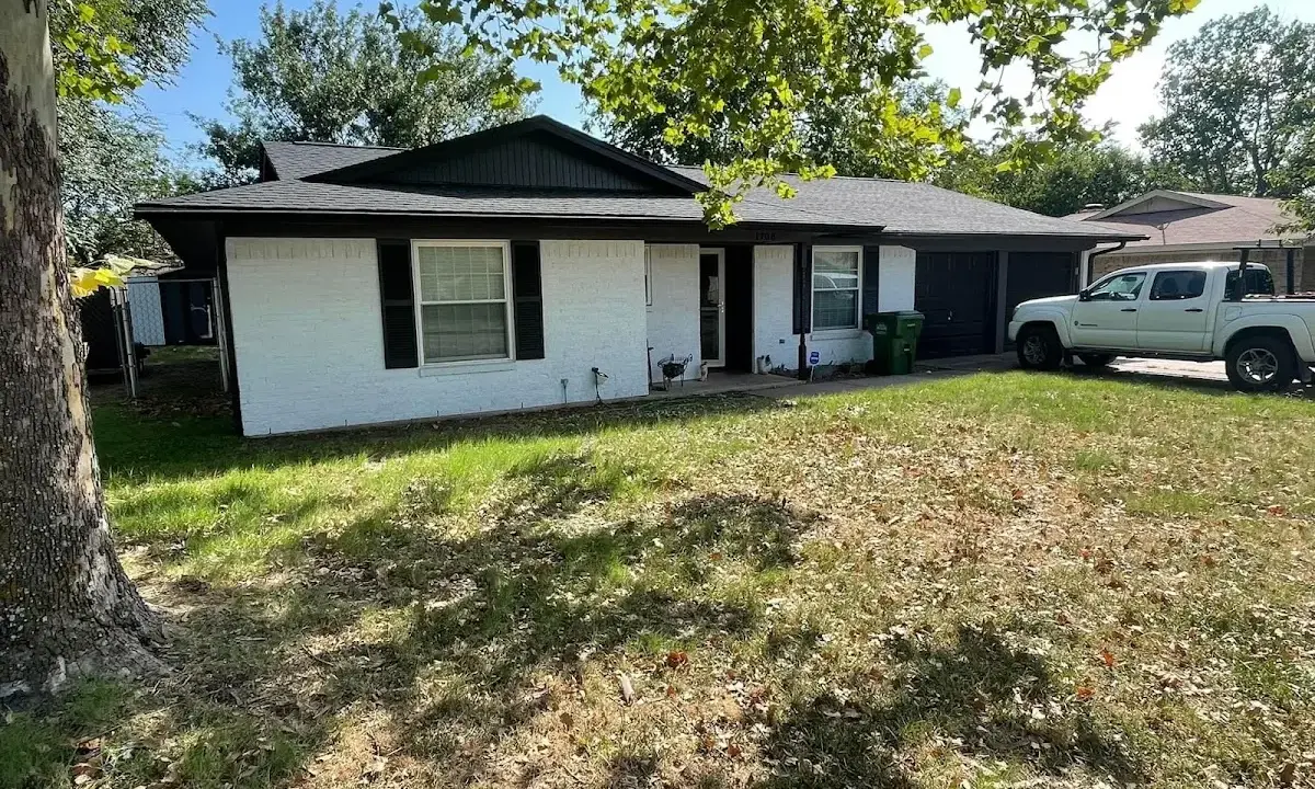 Professional roofing crew working on a residential roof in Birch Bay
